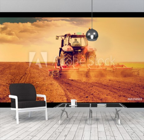 Picture of Farmer in tractor preparing land for sowing